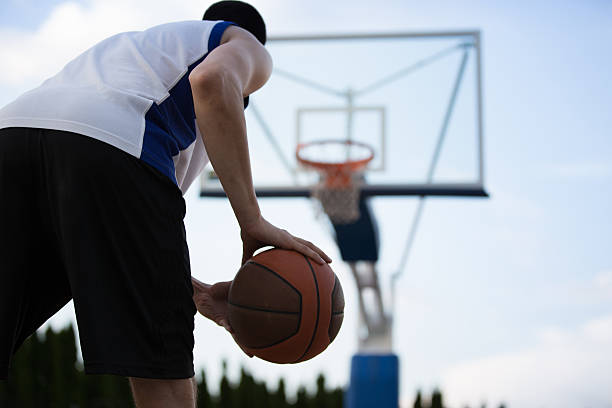 istock Basketball player training on the court. concept about basketbal 614988894