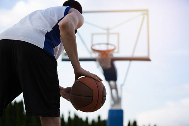 istock Basketball player training on the court. concept about basketbal 614988936