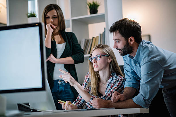 istock Young people planning startup business 614992580
