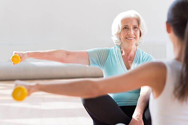 istock Good looking pleasant women sitting opposite each other 614993404