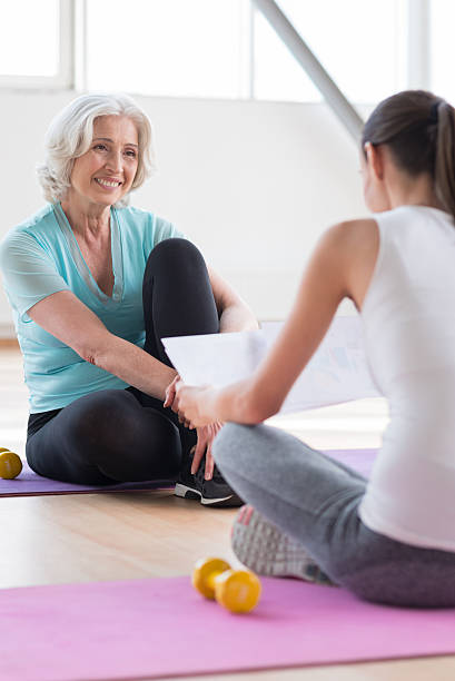 istock Happy pleasant women looking at each other 614993516