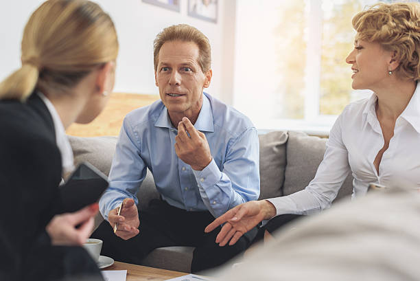 istock Group of businesspeople working in office 614994132