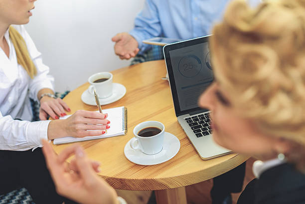 istock Group of businesspeople working in office 614994630