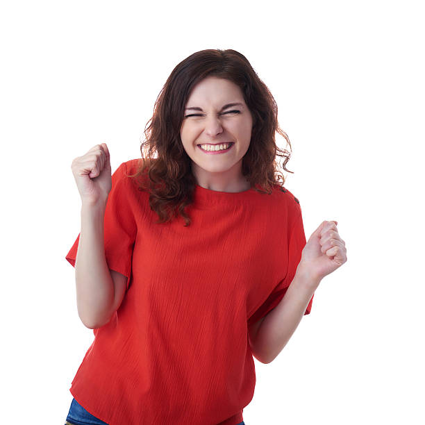 istock Smiling young woman over white isolated background 614995874