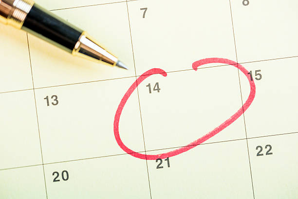 istock Pen on calendar with red circle. planning concept 614996714