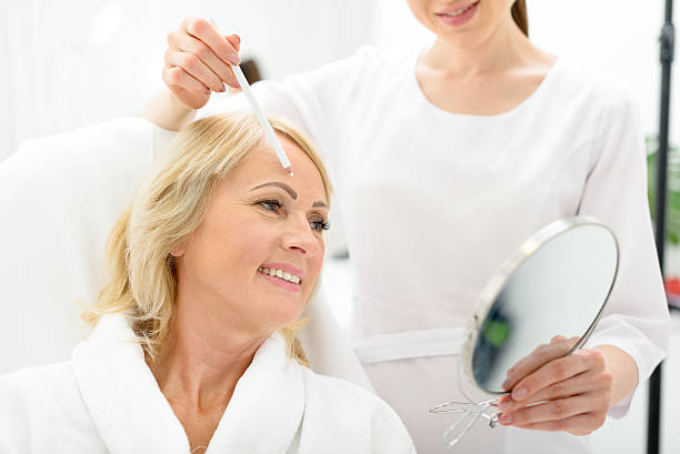 istock Satisfied senior lady at beauty salon 614997260