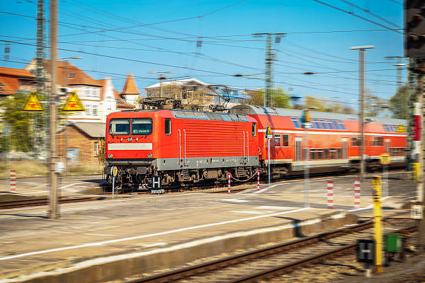 istock german regional express arrives on the train station 614997264