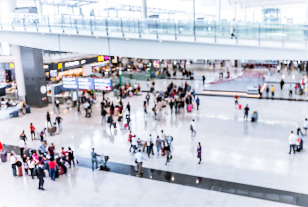 istock Abstract blur airport interior for backgounrd at Hong Kong 614997348