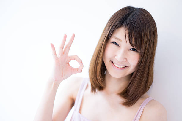 istock Woman making ok sign 615074672