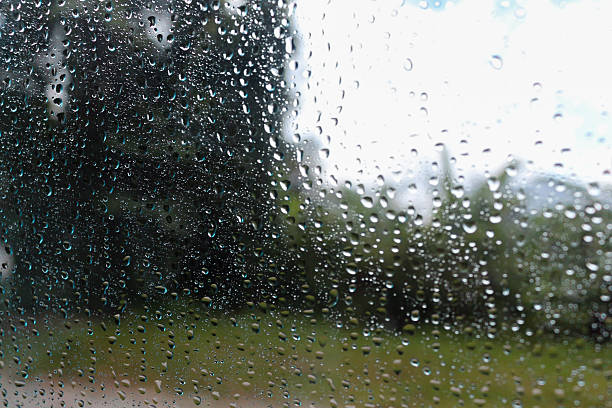 istock raindrop on glass in malaysia 615078414