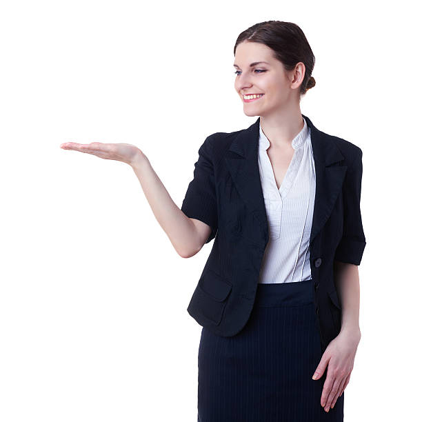 istock Smiling businesswoman standing over white isolated background 615080912