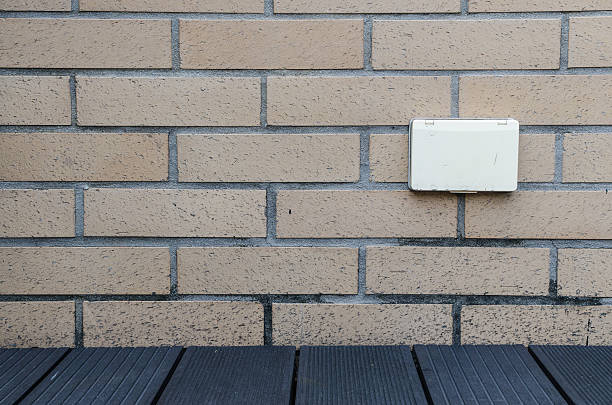 istock Outlet white Brown on the wall 615081406