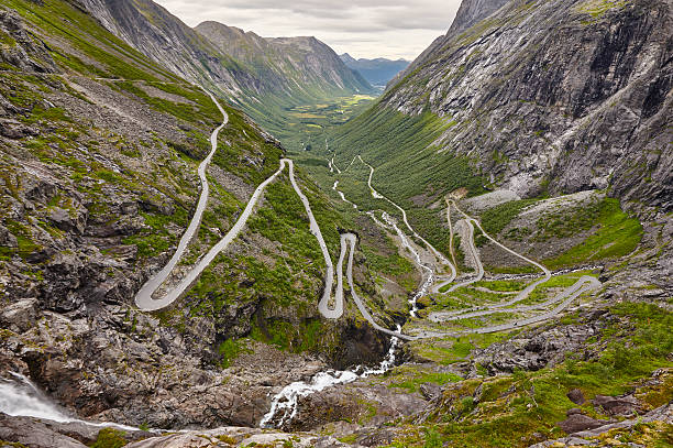 istock Norwegian mountain road. Trollstigen. Stigfossen waterfall. Norw 615081954