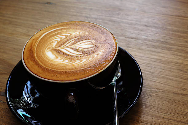 istock Hot coffee latte on a wooden table. 615082808