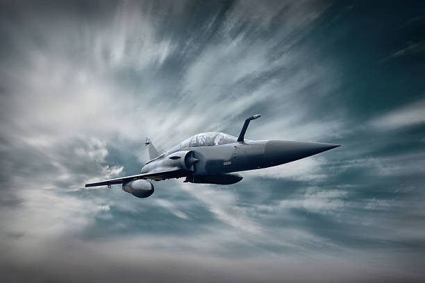 istock Military airplan on the speed in the sky 615083602