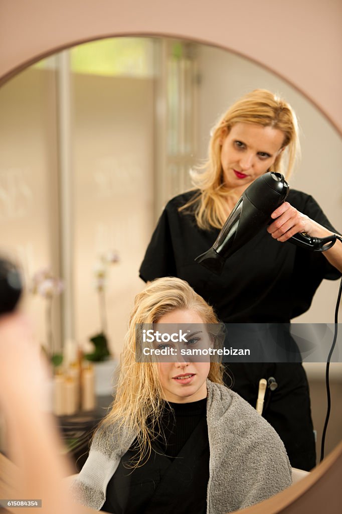Professional Hair Stylist At Work Hairdresser Doing Hairstyle Stock Photo -  Download Image Now - iStock