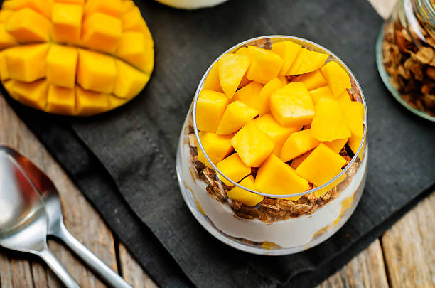 istock Greek yogurt granola mango parfait 615085108