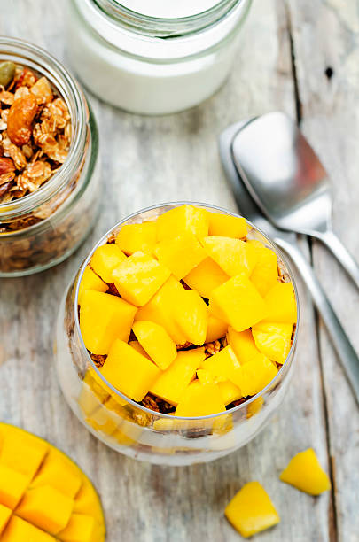 istock Greek yogurt granola mango parfait 615085140