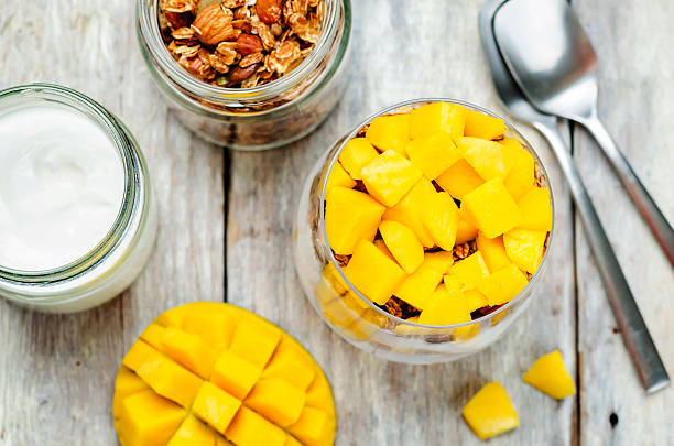 istock Greek yogurt granola mango parfait 615085150