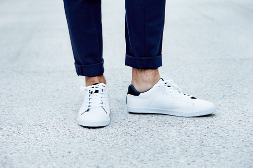 Man wearing sneakers, close up