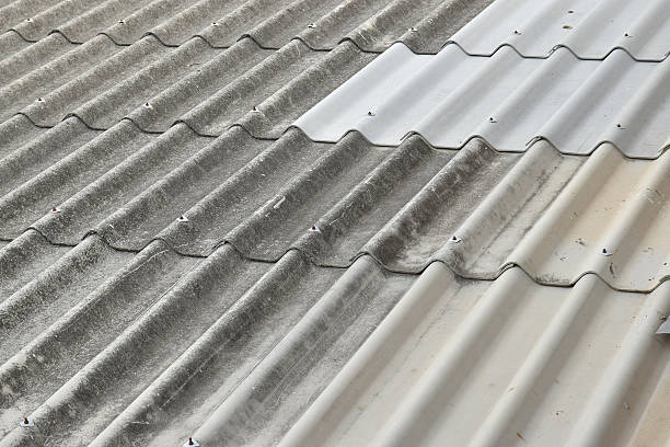 istock Asbestos roof in background 615086148