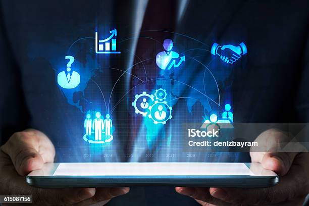 Human Resources Concept On Tablet With Hologram Stock Photo - Download Image Now - Insurance, Insurance Agent, Digitally Generated Image