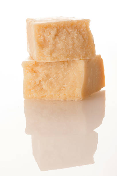 istock Parmesan cheese isolated over white background 615088270