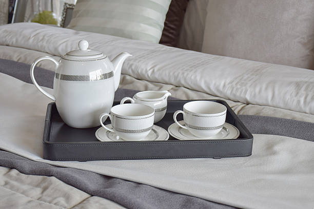 istock elegant tea cup set on black tray in modern bedroom 615088306