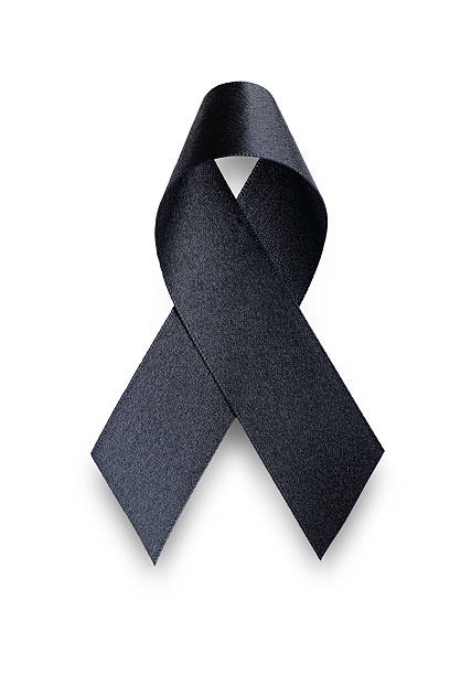istock Black awareness ribbon.Mourning and melanoma symbol 615088986