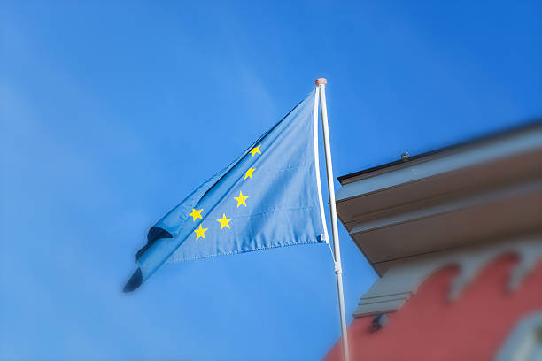 EU flag in front of an old building EU flag in front of an old building in the background a blue sky christian democratic union photos stock pictures, royalty-free photos & images
