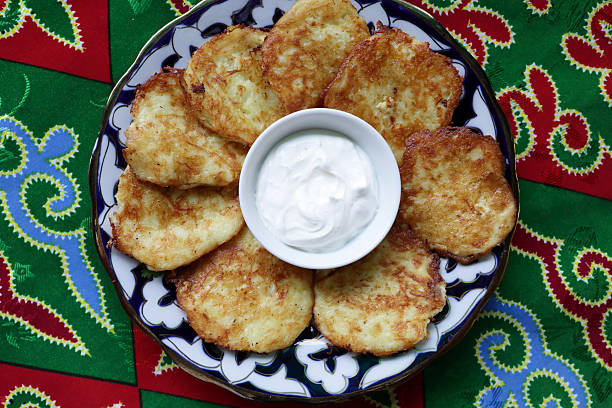 istock Potato pancakes with sour cream 615090032