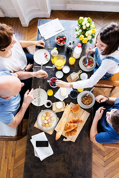 Happy Family Having Breakfast