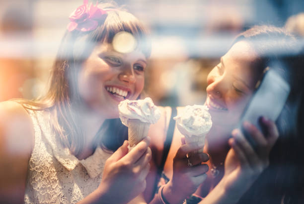 istock Two Girls Having Fun and Taking a Selfie 615092708