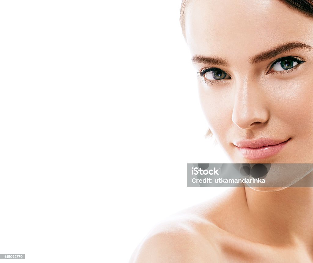 Beauty Woman face with perfect skin Portrait. Isolated on white. Beauty Woman face Portrait. Beautiful model Girl with Perfect Fresh Clean Skin color lips purple red. Blonde brunette short hair Youth and Skin Care Concept. Isolated on a white background Human Face Stock Photo