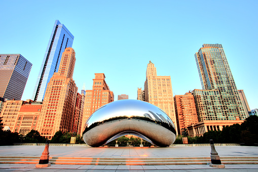 Chicago, United States - September 3, 2015: Cloud Gate in Millennium Park. The Cloud Gate is a major tourist attraction and a gate to traditional Chicago Jazz Fest.