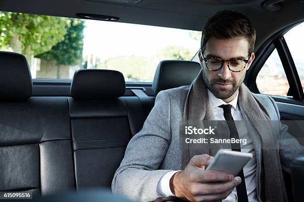 Business Texting Stock Photo - Download Image Now - Car, Businessman, Smart Phone