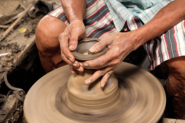 istock Arts and crafts working clay bowls. 615095824