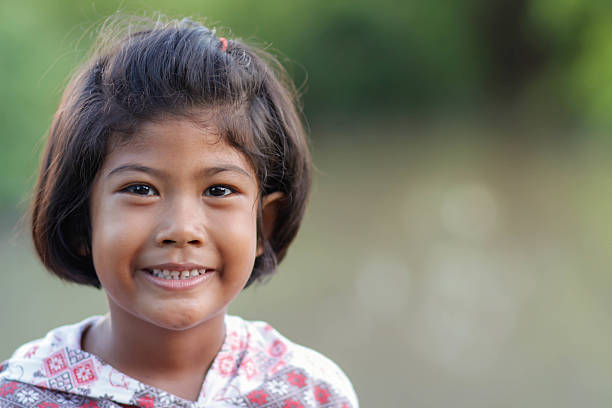 istock young girl smiling 615095956