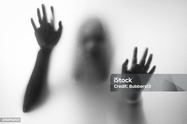 Horror Woman Behind The Matte Glass Stock Photo - Download Image Now - Spooky, Horror, Ghost