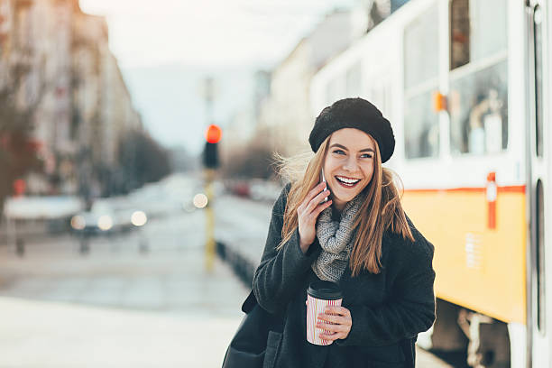 istock Happy girl talking on the phone 615096564