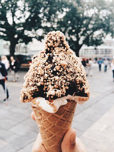 istock Tasty ice cream with chocolate and cereal covered 615097646