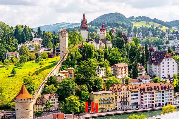 Top view on the old town with fortification wall and towers in Lucerne city in Switzerland