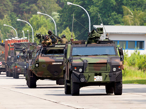 german military army convoy, drives on a street Burg, Germany - June 25, 2016: german military army convoy, drives on a street at open day in barrack burg / germany at june 25, 2016 german armed forces stock pictures, royalty-free photos & images