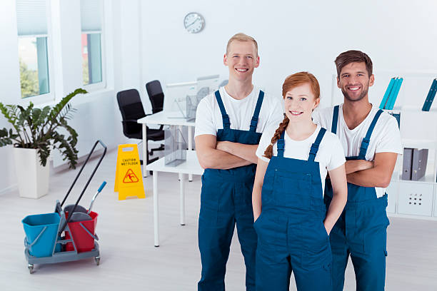istock Group of professional cleaners 615098368
