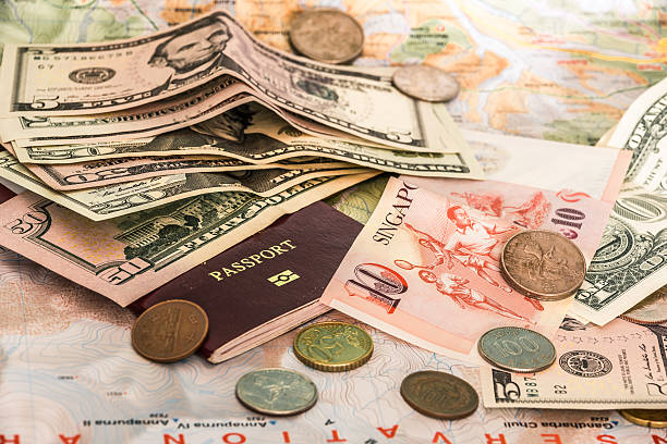 istock cash and passport 615099064