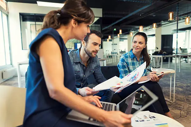 Photo of Collaborative teamwork in modern office space