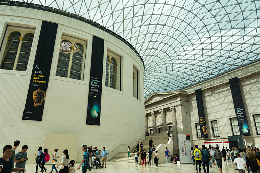 London, United Kingdom - July 10, 2016: Tourists at the British Museum, picture taken from the interior