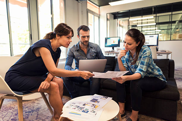 istock Business leader woman working with her team in startup 615100034