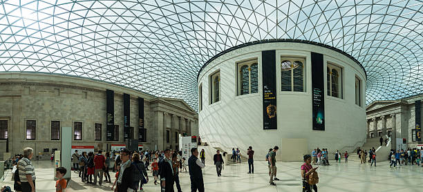 The British Museum London, United Kingdom - July 10, 2016: Tourists at the British Museum, picture taken from the interior british museum stock pictures, royalty-free photos & images