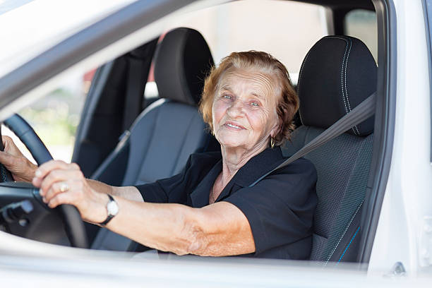 istock Elderly woman behind the steering wheel 615100280